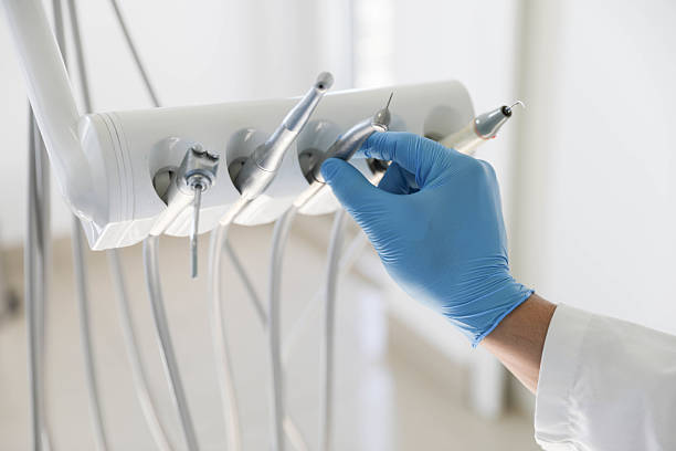 Professional Root Canal Treatment technician working in Abilene, TX